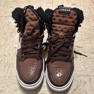 Brown and black high tops with fur inside shoes